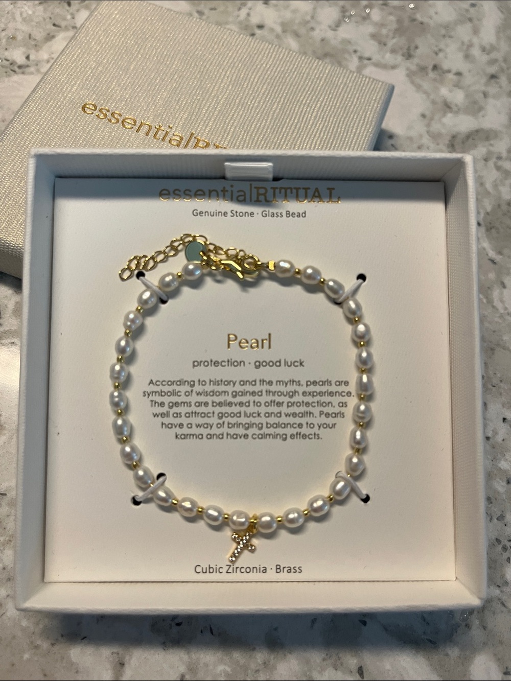 Essentials White Pearl Bracelet with Gold Chain and Cross Charm